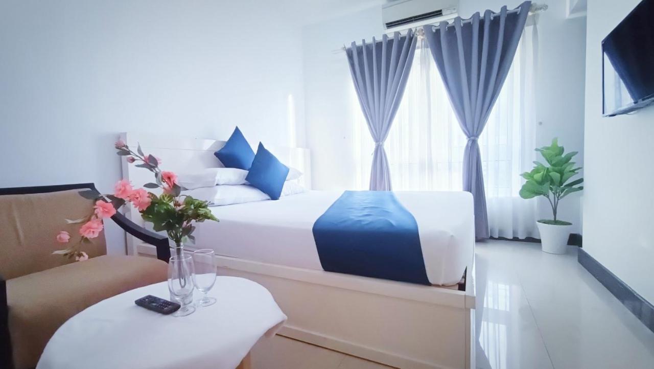 Queen Central Apartment Hotel Хошимин Экстерьер фото